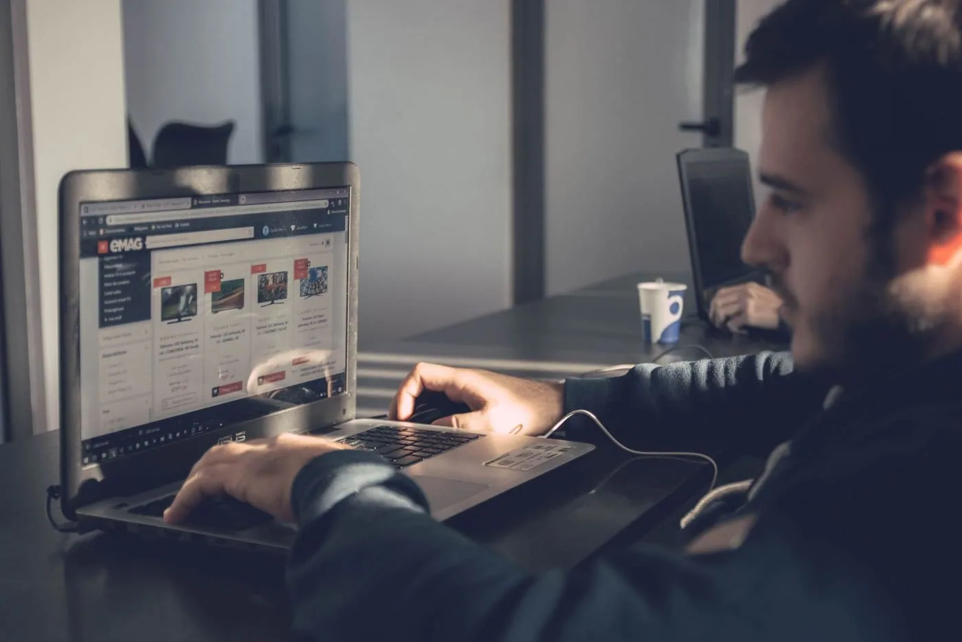 Browsing an online marketplace on a laptop